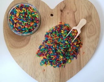 Rainbow rice. Tray play. Sensory bases. Coloured rice.