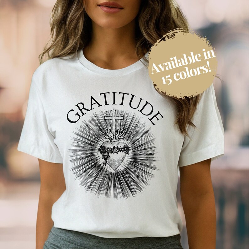 This Sacred Heart of Jesus t-shirt features a beautiful yet minimalistic design with the word GRATITUDE at the top - perfect unisex gift for any devout Catholic man or woman!