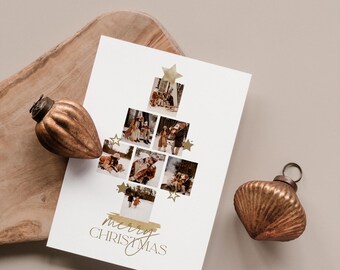 May include: A white Christmas card with family photos arranged in a tree shape, adorned with gold star accents. The card features the text "merry CHRISTmas" in gold script, and is accompanied by two bronze-colored ornaments.