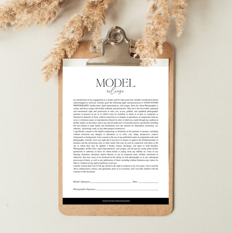 May include: A clipboard with a model release form, featuring the title "MODEL release" in a minimalist font. The document is secured by a silver clip, with dried floral accents at the top. The form includes signature lines.
