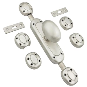 May include: A brushed nickel door bolt set with an oval handle and matching oval backplates. The set includes a long bolt, two strike plates, and several oval-shaped backplates with screw holes.