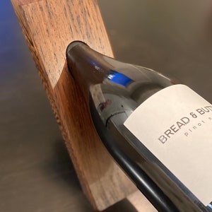 Gravity defying wooden wine bottle holder, wine bottle stand, wine display, wine accessory