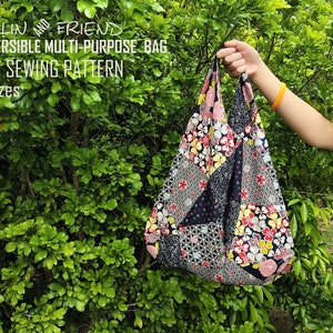May include: A reversible multi-purpose bag with a floral patchwork design. The bag is held up by a person's hand. The text on the image reads: "MALIN AND FRIEND REVERSIBLE MULTI-PURPOSE BAG PDF SEWING PATTERN 3 Sizes."