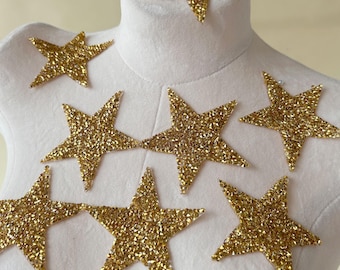 Conjunto de 10 estrelas termocolantes com strass e gel brilhante para vestidos de festa e fantasias.