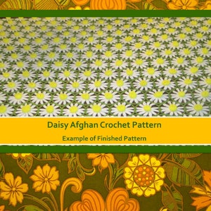 May include: A crochet pattern for a daisy afghan. The image shows an example of the finished pattern, which is a white and yellow daisy design on a green background. The text "Daisy Afghan Crochet Pattern" and "Example of Finished Pattern" is displayed below the image.