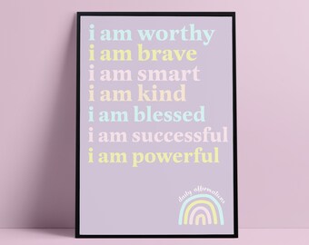 May include: A framed print with a light purple background and white text that reads "i am worthy, i am brave, i am smart, i am kind, i am blessed, i am successful, i am powerful". The bottom of the print features a rainbow with the text "daily affirmations".