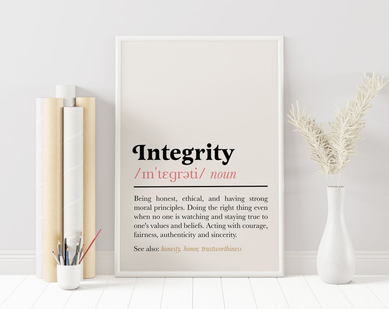 May include: A printable poster with a beige background and black text. The poster defines the word "Integrity" with a pronunciation guide and a definition. The definition is: "Being honest, ethical, and having strong moral principles. Doing the right thing even when no one is watching and staying true to one's values and beliefs. Acting with courage, fairness, authenticity and sincerity. See also: honesty, honour, trustworthiness."