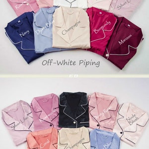 May include: Color chart for a pajama set with off-white and black piping. The chart shows 12 different colors, including dusty rose, white, navy, dusty blue, champagne, burgundy, maroon, silver lilac, rosewood, coral, and nude blush.