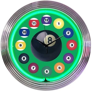 May include: A green neon clock with a black and white billiard ball in the center. The clock face is surrounded by 12 billiard balls, each with a number from 1 to 12.