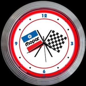 May include: A neon clock with a white face and red neon trim. The clock features a checkered flag and a Mopar logo with the words "Mopar" in red and blue. The clock has black numbers and hands.