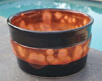 Ceramic Bowl with Orange Crystal Glaze Interior and Black Gloss Exterior