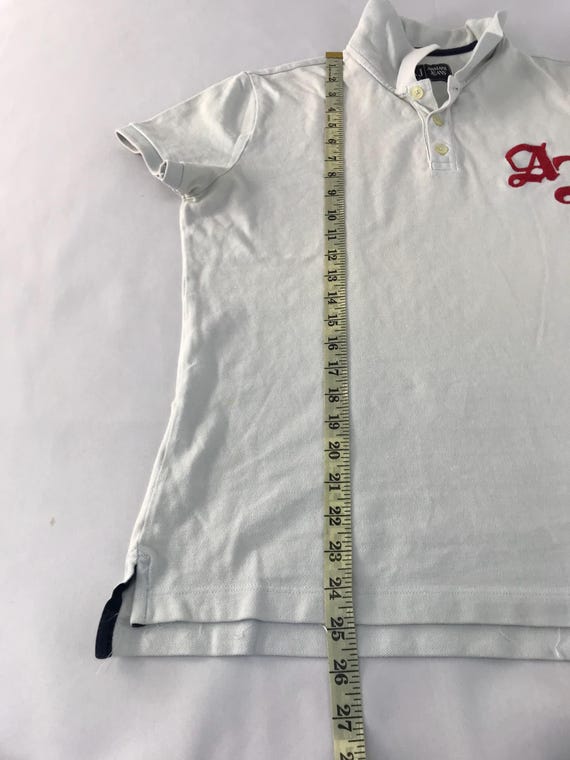 Maglietta polo vintage Armani Jeans con grande logo, ispirata allo