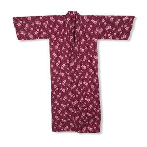 May include: A burgundy kimono-style robe with a floral pattern. The robe has a wrap-around design, wide sleeves, and a matching belt. The floral pattern features small, pink blossoms across the fabric. The robe is made of a lightweight material.