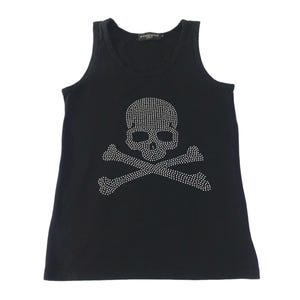May include: Black tank top with a white rhinestone skull and crossbones design.