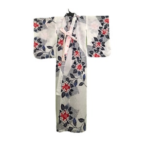 May include: White Japanese kimono with a floral pattern in red, blue, and black. The kimono has a tie closure and is displayed on a hanger. The floral design includes stylized flowers and leaves.