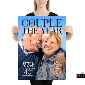 May include: A magazine cover with a photo of an older couple smiling and hugging. The headline reads "Couple of the Year" with the date "5.11.2021" and the text "Love is in the air". The text below the photo reads "Betty & Albert Celebrate their 40th Anniversary!" and "Love is not a matter of counting the years, but making the years count". The magazine cover is 18 inches by 24 inches.