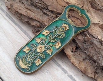 Vintage bronze large opener with enamel and ornaments on both sides