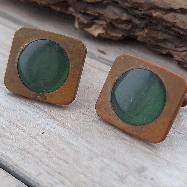 Vintage cufflinks of the USSR in a plastic case. Original Soviet cufflinks with glass green inserts