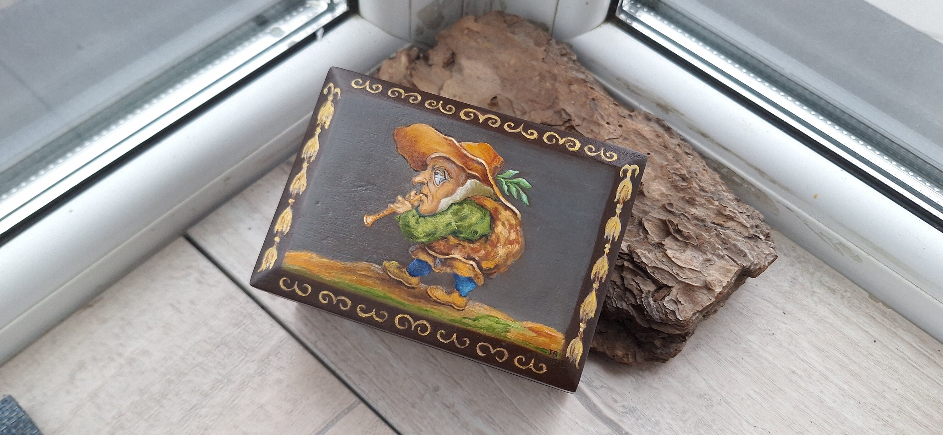 A beautiful souvenir wooden casket is hand-painted