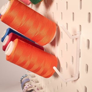 IKEA dual overlock sewing thread spools holders for SKÅDIS pegboard sewing and craft room - thread storage