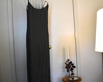 Vintage zwarte maxi-jurk met bandjes en bloemenprint uit de jaren 90, maat 6