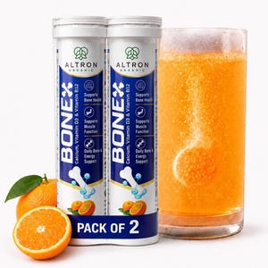 May include: Two white cylindrical tubes of Altron Organic Bonex effervescent tablets labeled with Calcium, Vitamin D3, and Vitamin B12, featuring orange graphics. Next to the tubes is a glass of orange liquid with a dissolving tablet and fresh oranges.