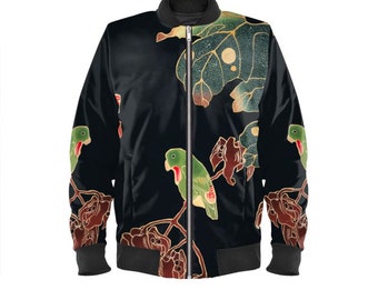 May include: Black bomber jacket featuring a vibrant design of green parrots perched on branches with red accents. The jacket has a full-length zipper, black ribbed cuffs, and a black collar. The design also includes large leaves with gold and green details.