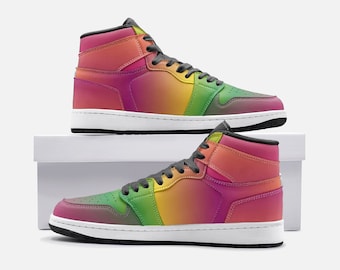 May include: High-top sneakers with a vibrant rainbow gradient design. The shoes feature a white sole, black laces, and a padded collar. The color transitions from pink to orange, yellow, and green. The sneakers are displayed on a white surface.