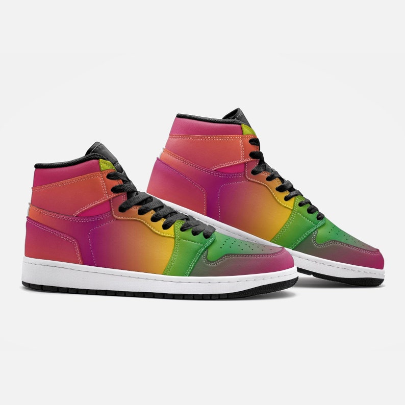 May include: High-top sneakers with a vibrant rainbow gradient design. The shoes transition from pink to orange, yellow, green, and finally, a deep green at the toe. They feature black laces, a black tongue, and a white sole.