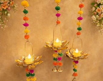 Handcrafted Brass Lotus Tea Light Hanging with Multicolor Pom Pom Strands