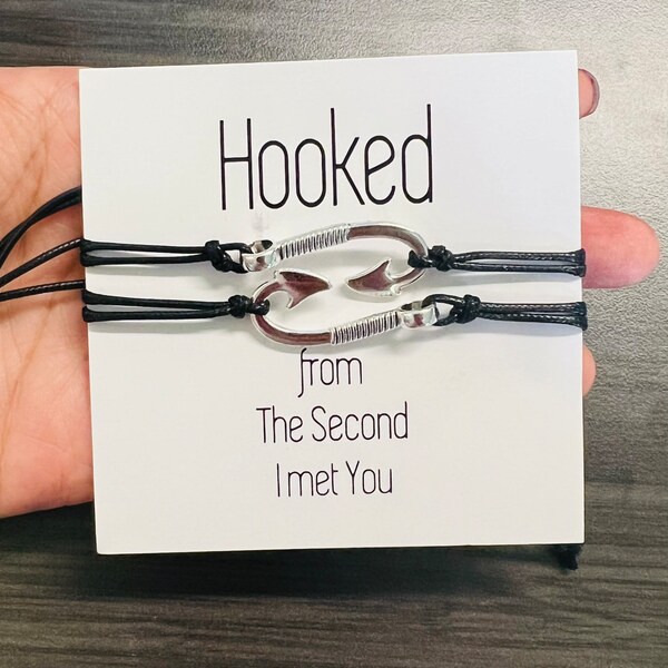 Beautiful Hooked charm bracelet adjustable size comes with 2pcs bracelets (colors available in black or red)