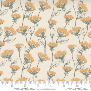 May include: White fabric with a repeating pattern of yellow and green stylized flowers. The fabric has a ruler with the word "moda" printed on it.