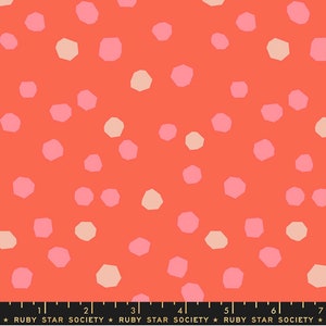 May include: A seamless pattern featuring a coral background with scattered pink and cream irregular octagons.