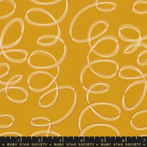 May include: A mustard yellow fabric with a white and light brown abstract pattern of swirling lines and circles.
