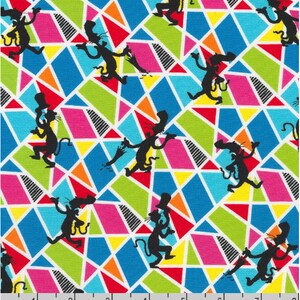 May include: A colorful fabric with a repeating pattern of a black silhouette of a cat wearing a top hat and holding an umbrella. The background is a geometric pattern of bright colors, including red, orange, yellow, green, blue, and pink.