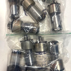 May include: A set of three ceramic mugs with a speckled, matte finish. The mugs are in shades of cream, light gray, and dark gray. Each mug has a simple, minimalist design, perfect for coffee or tea.