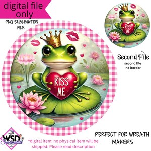 May include: A green frog wearing a gold crown holds a red heart that says "Kiss Me" in a pink and white checkered background. The frog is sitting on a lily pad in a pond with pink flowers.