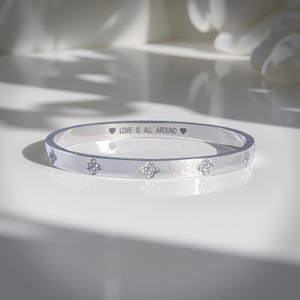 Silver Bangle Bracelet with Zirconia Clovers and Engraved 'Love is All Around' Message. Friendship, Anniversary, Birthday Luxury Gift Box