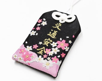 Japanese OMAMORI AMULET CHARM for "Safety Driving" black and pink sakura design from Shirasaki Hachimangu