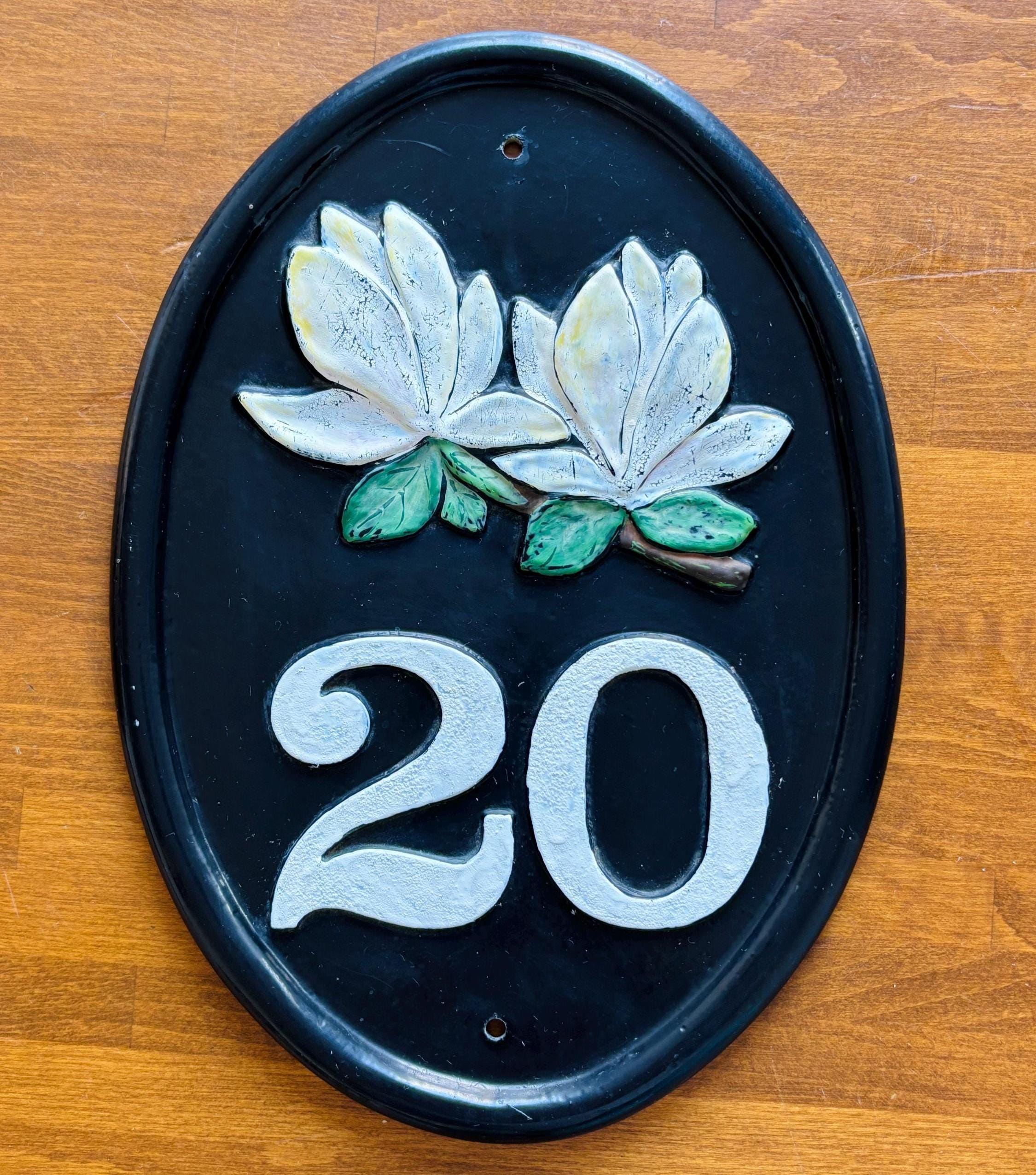Cast Iron House Number Plaque: Black Oval Sign with White Magnolias