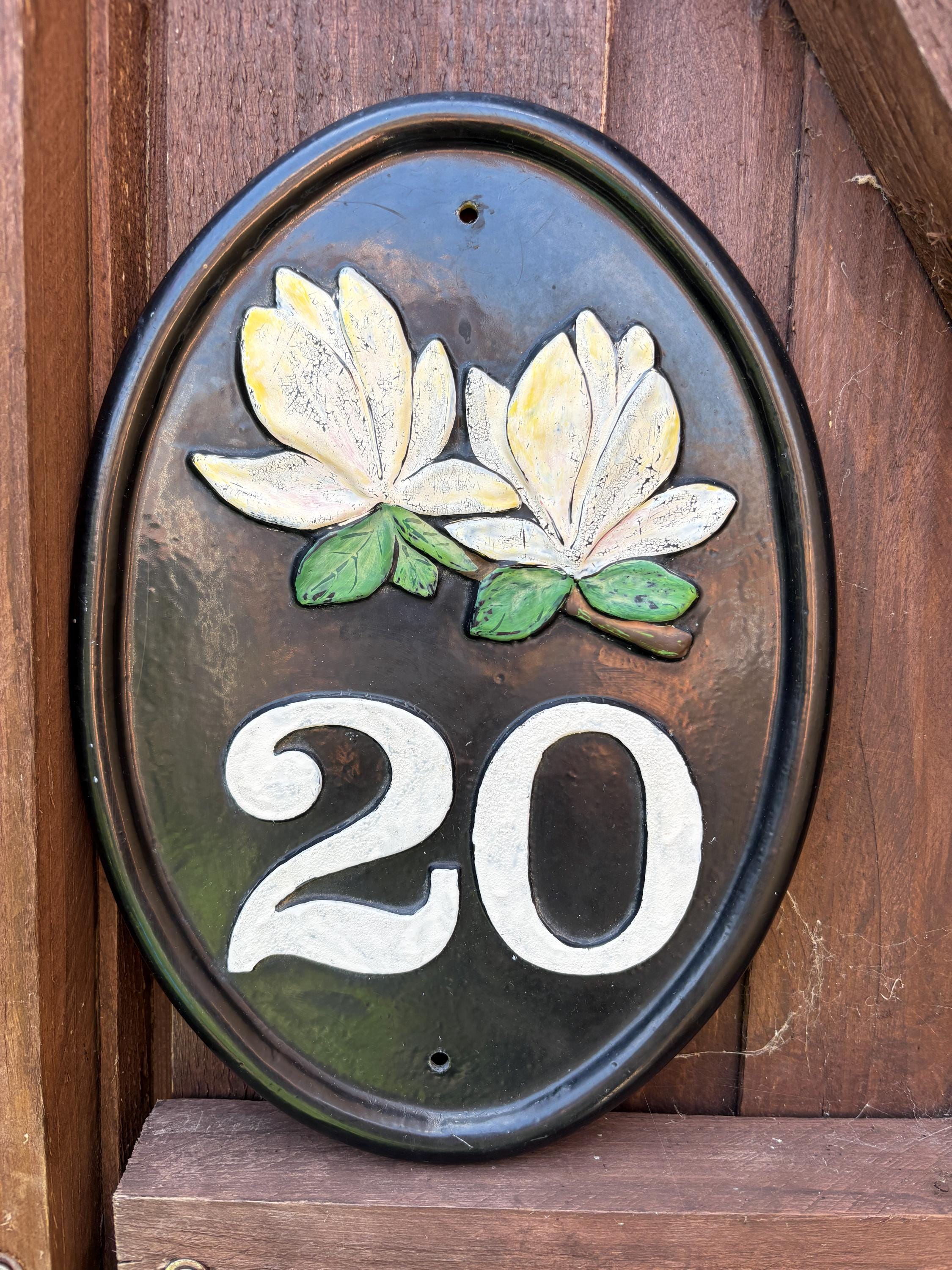 Cast Iron House Number Plaque: Black Oval Sign with White Magnolias