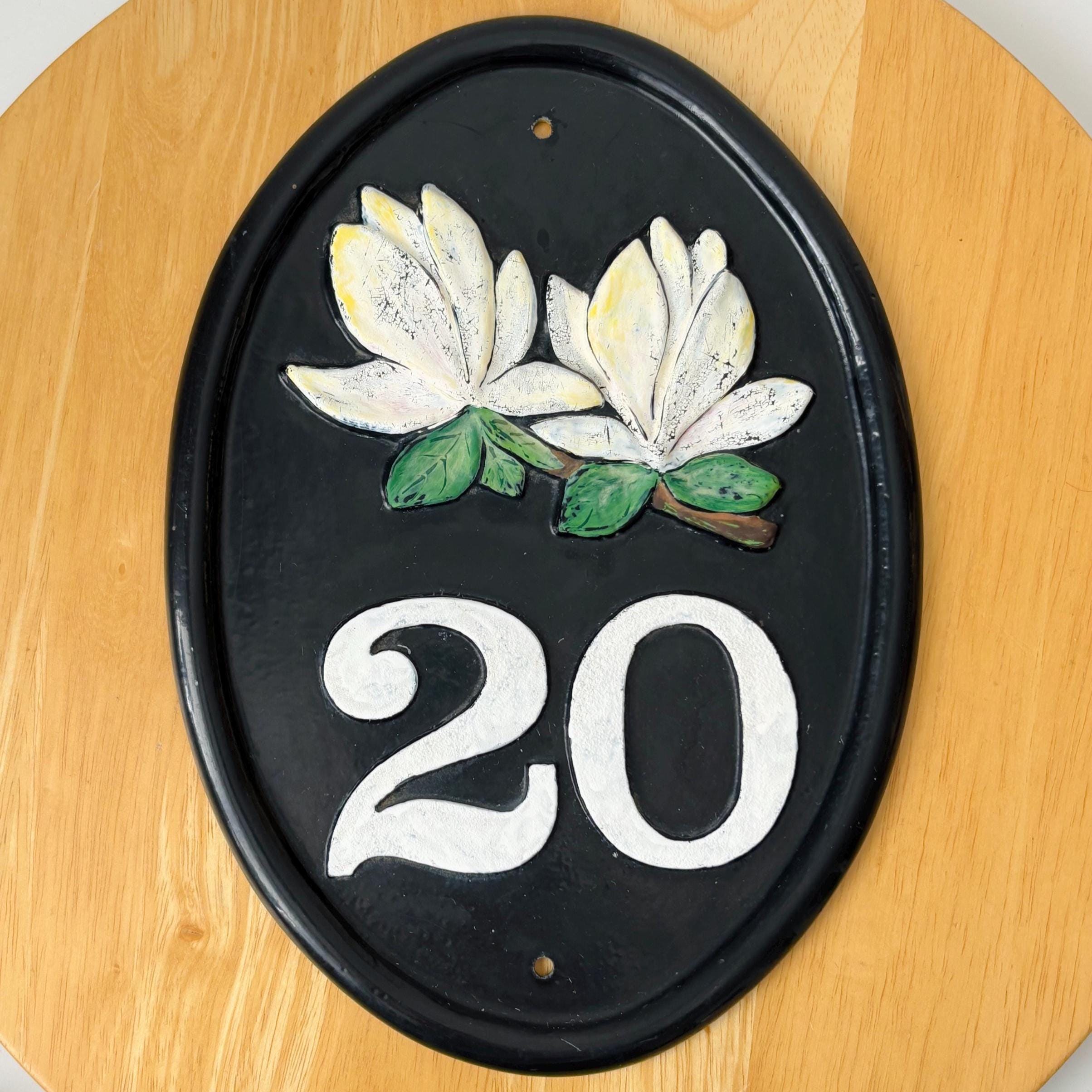 Cast Iron House Number Plaque: Black Oval Sign with White Magnolias