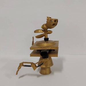 May include: A gold-colored 3D printed robot with a square base, a round base, and a head with a propeller. The robot has a single arm with a claw.