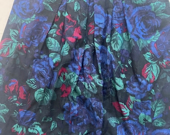 Mörk blommig midikjol
