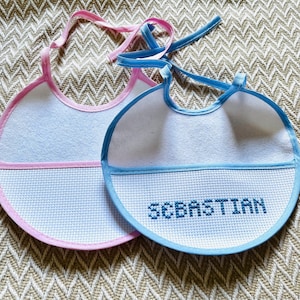 Hand cross stitch personalised baby bib