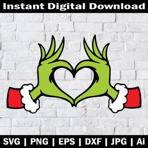 May include: Green Grinch hand making a heart shape with red and white Santa hat.  The Grinch is a popular Christmas character.