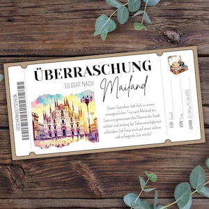 以下が含まれることがあります： ブラウンとベージュのギフト券で、「Überraschung」と「Es geht nach Mailand」の文字が書かれています。ギフト券には、イタリアのミラノにある有名な大聖堂であるドゥオモのウォーターカラーイラストが描かれています。「GESCHENKGUTSCHEIN」という文字がギフト券の左側に印刷されています。