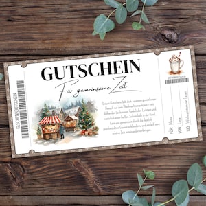 May include: A gift certificate with the word "GUTSCHEIN" at the top, and "Für gemeinsame Zeit" below it. The certificate features a watercolor illustration of a Christmas market and a cup of hot chocolate. Text includes "Mama" and "Lena".