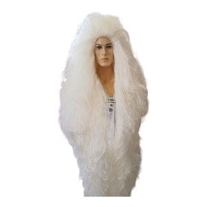 May include: A long, white wig with a wavy texture. The wig is styled with a center part and falls to the shoulders.
