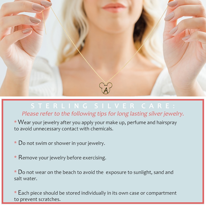 May include: A close-up of a gold necklace with a Mickey Mouse charm featuring the letter "A". The necklace is worn by a person with their hands visible. The image includes text that reads "STERLING SILVER CARE: Please refer to the following tips for long lasting silver jewelry. * Wear your jewelry after you apply your make up, perfume and hairspray to avoid unnecessary contact with chemicals. * Do not swim or shower in your jewelry. * Remove your jewelry before exercising. * Do not wear on the beach to avoid the exposure to sunlight, sand and salt water. * Each piece should be stored individually in its own case or compartment to prevent scratches."